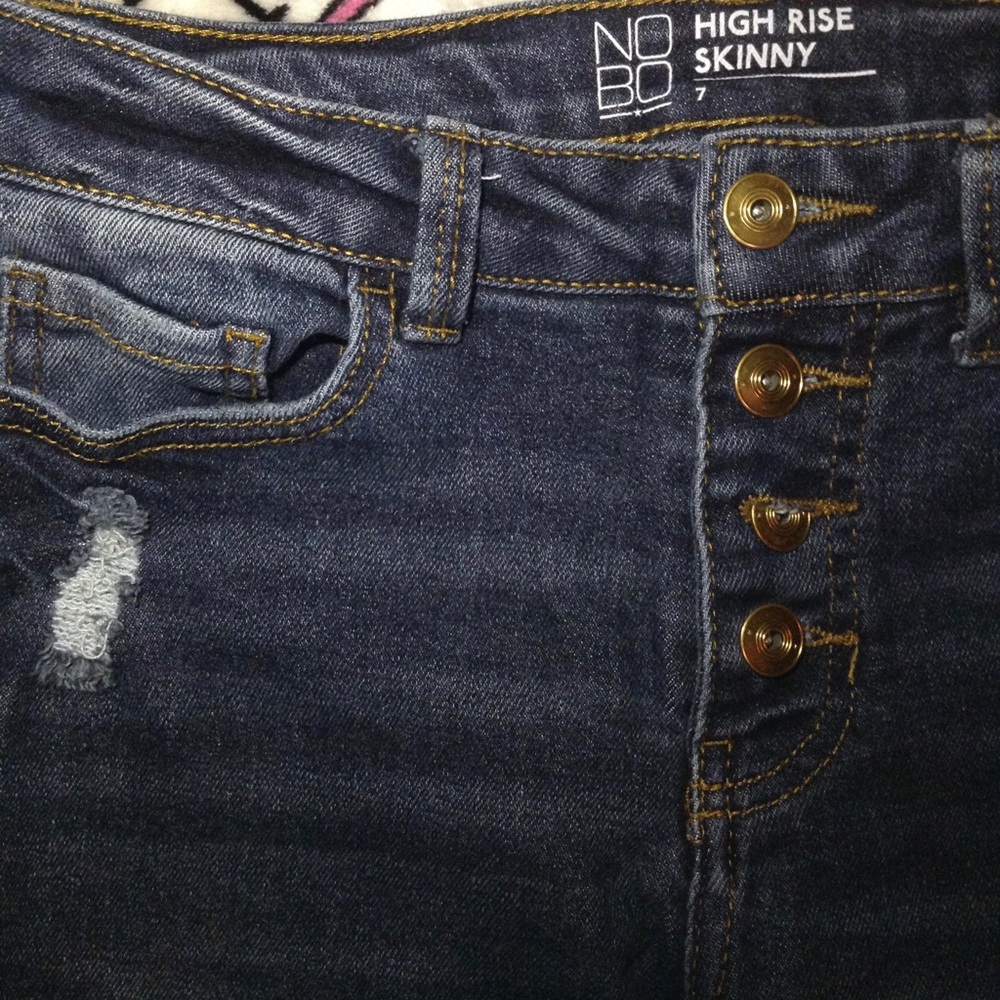 Knee ripped, high rise jeans